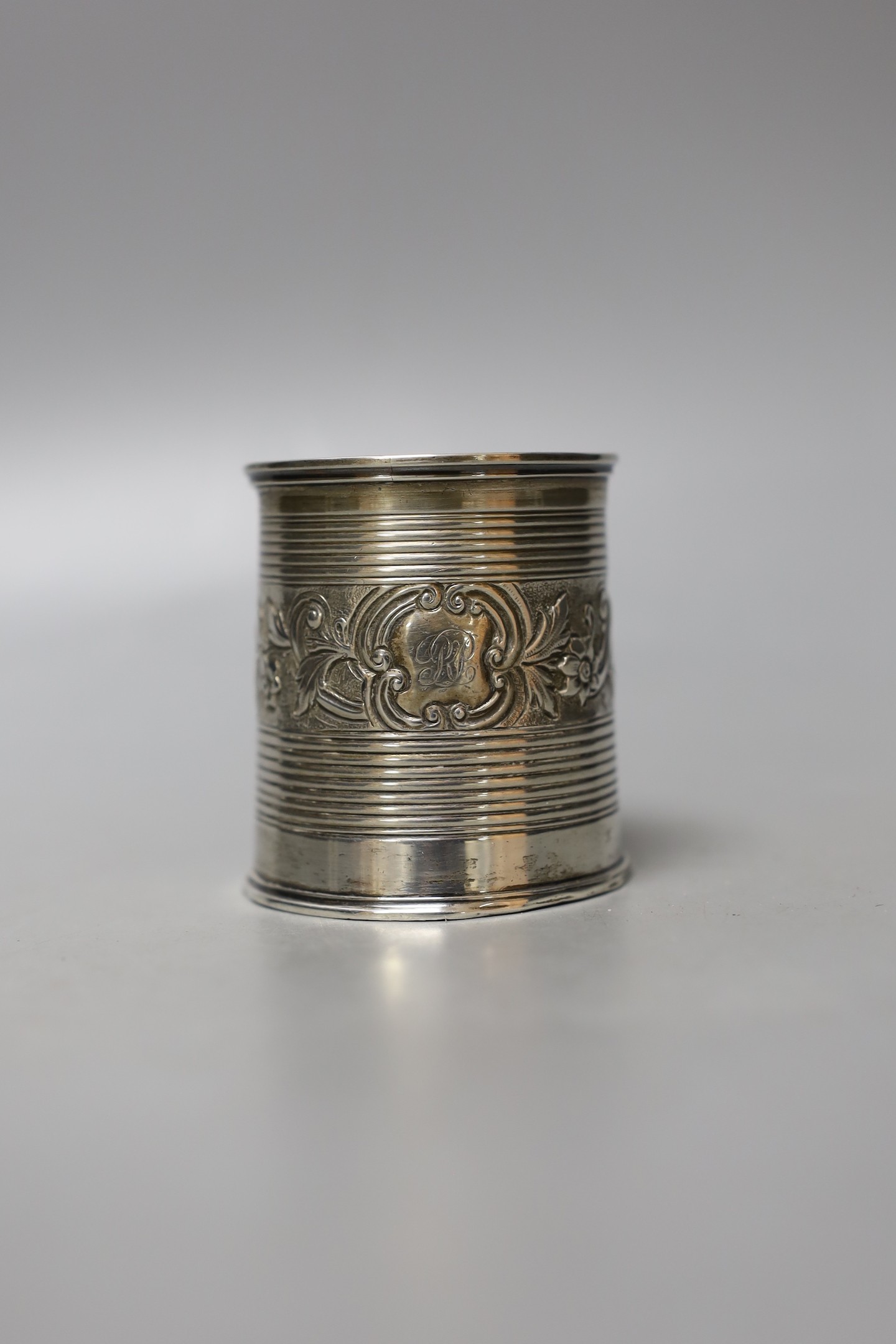 A William IV silver christening mug, with reeded and embossed decoration, London, 1834, 63mm, 98 grams